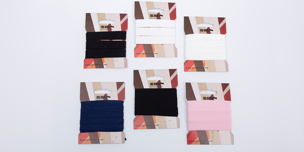 Vevd/veving av elastisk webbing